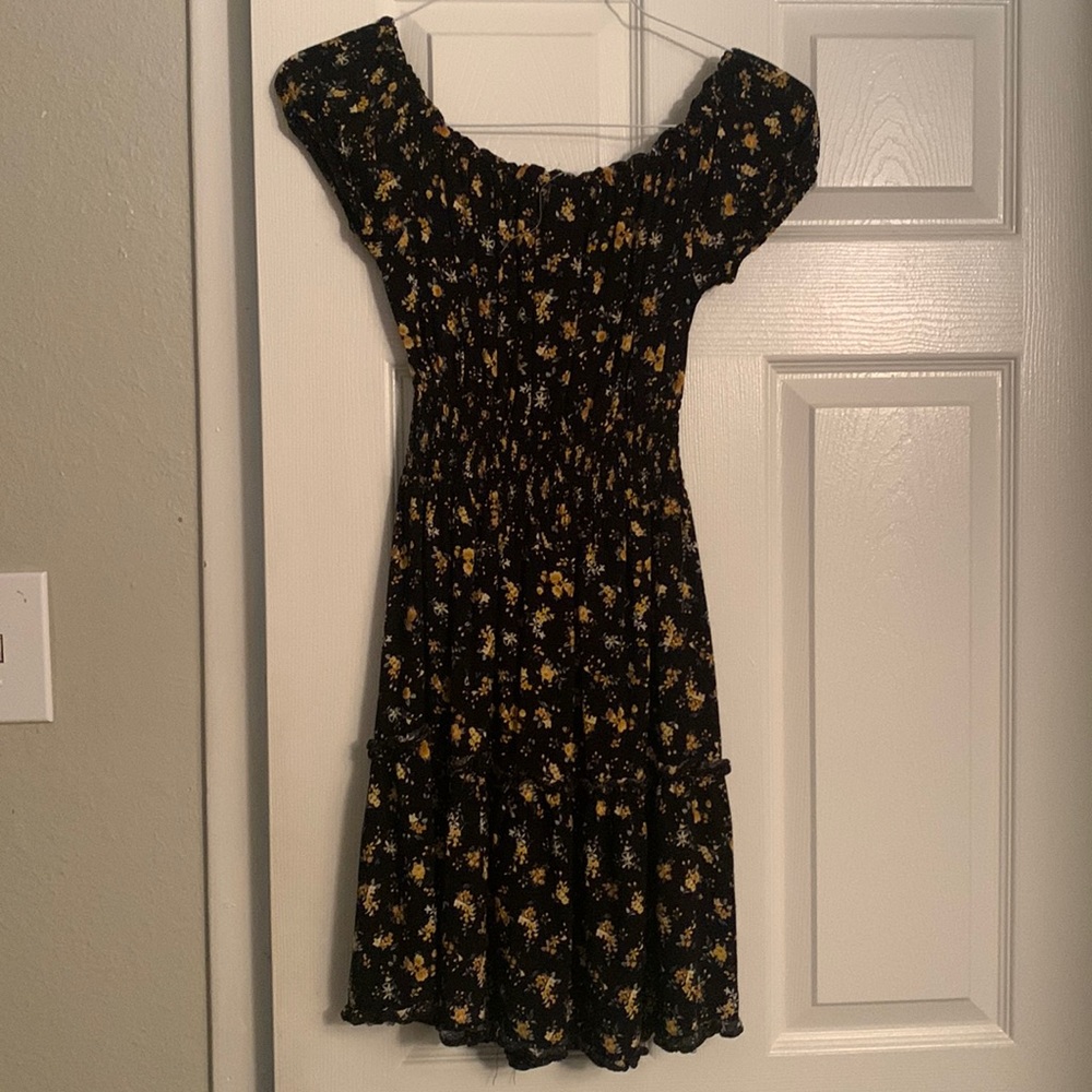 Flower below the shoulders dress